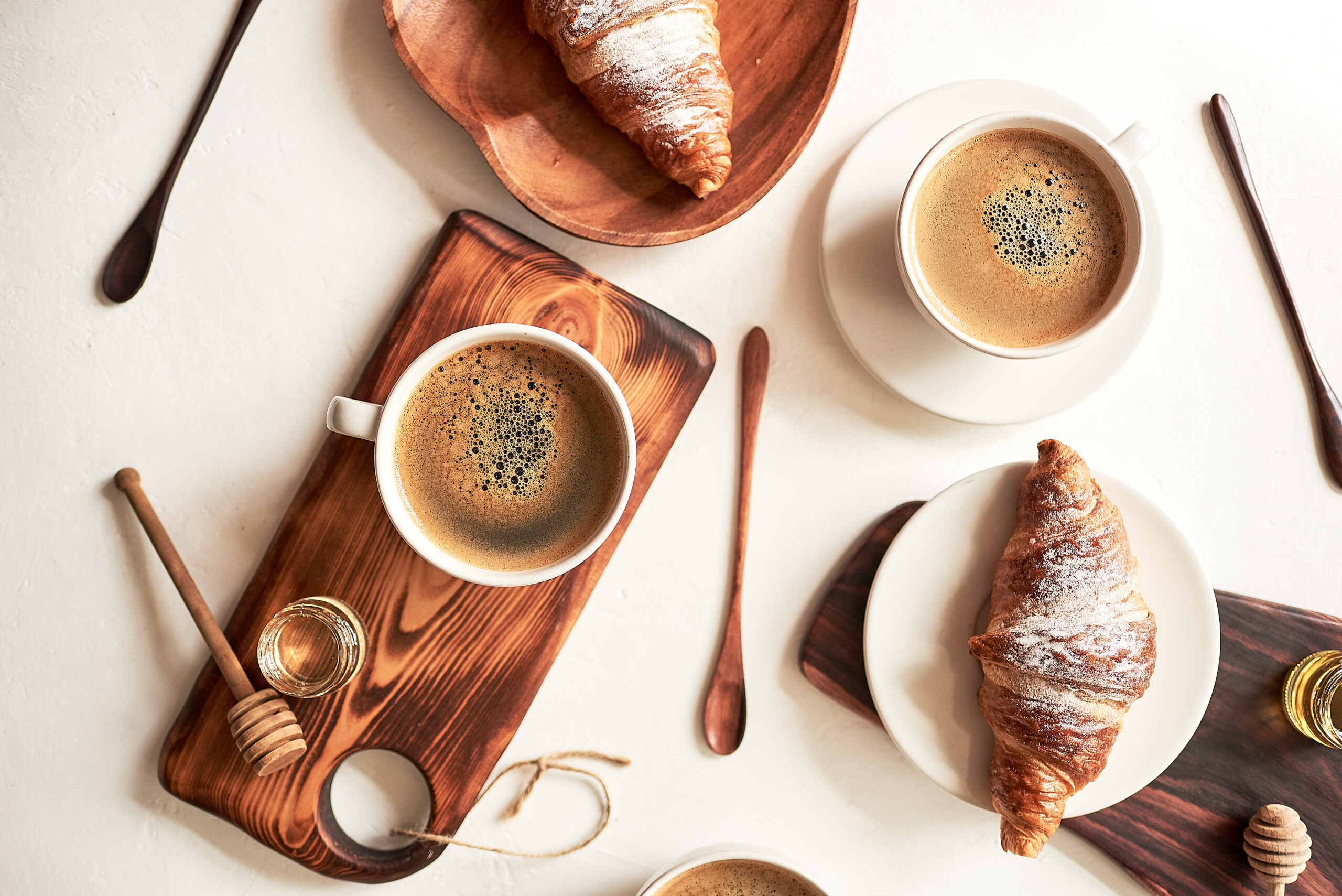 European breakfast, top view, coffee, croissants, honey, nuts, good morning concept